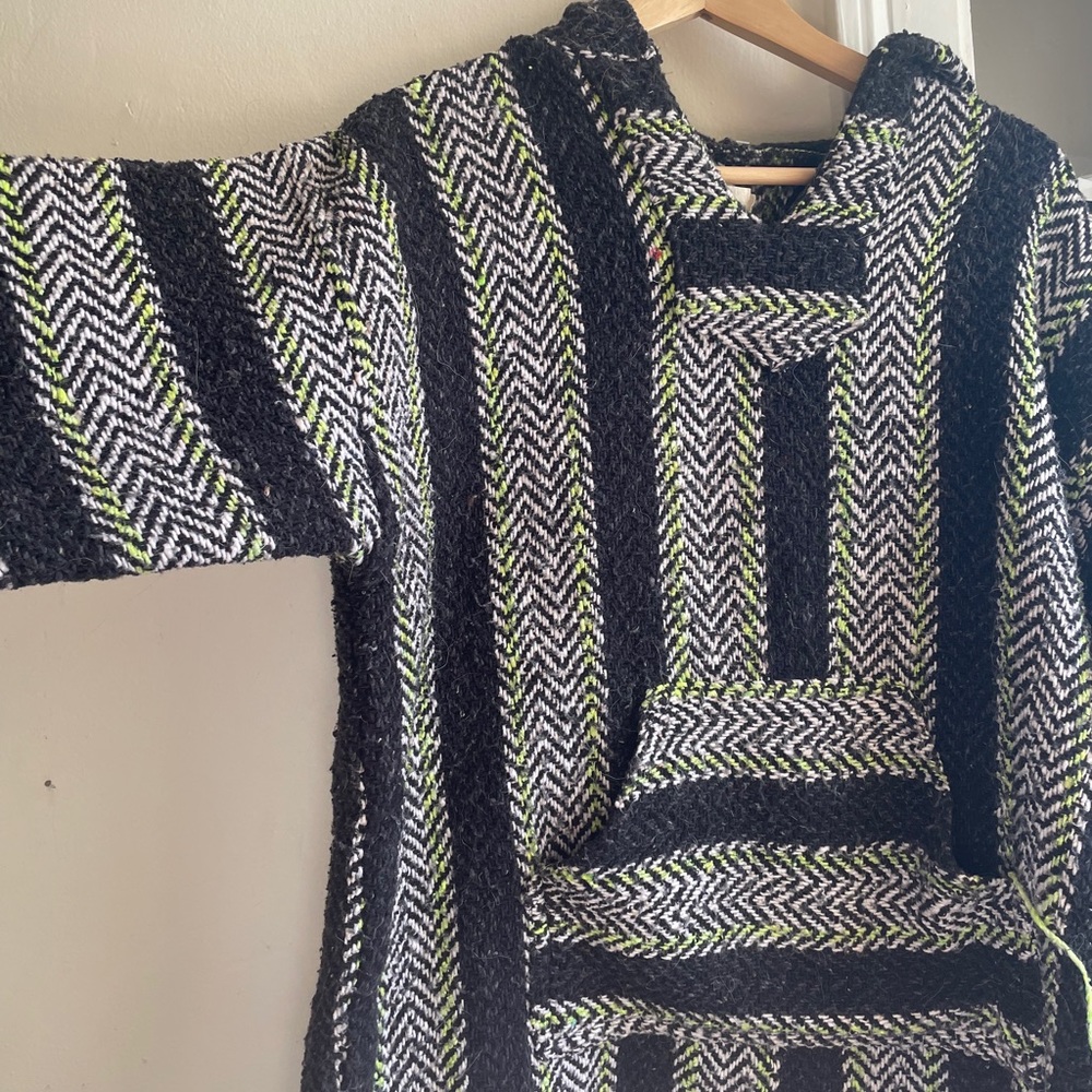 Black and white and neon green cozy hooded pullover